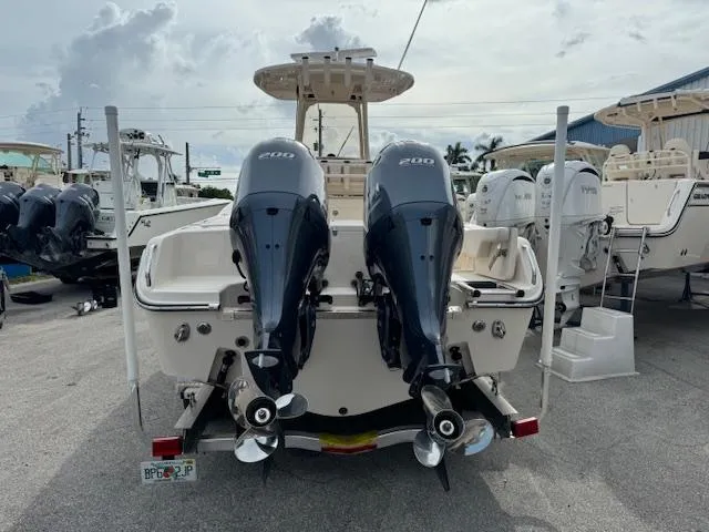 Slide: The Image of 2023 Grady-White Fisherman 257 with dual 200 horsepower engines, rear view. - 2