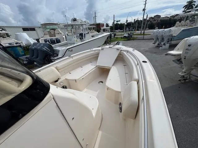 Slide: The Image of 2023 Grady-White Fisherman 257 boat, spacious deck, parked at a marina. - 21