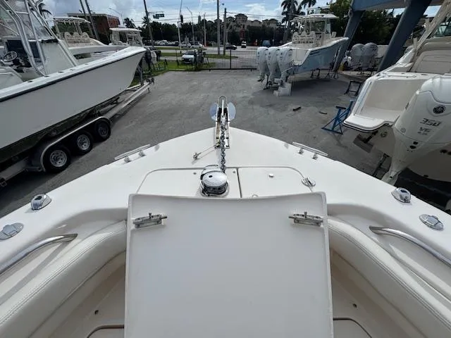 Slide: The Image of 2023 Grady-White Fisherman 257 boat bow view at a marina. - 22