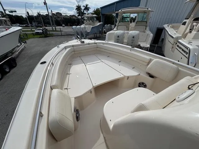 Slide: The Image of 2023 Grady-White Fisherman 257 boat interior with spacious seating and storage. - 23