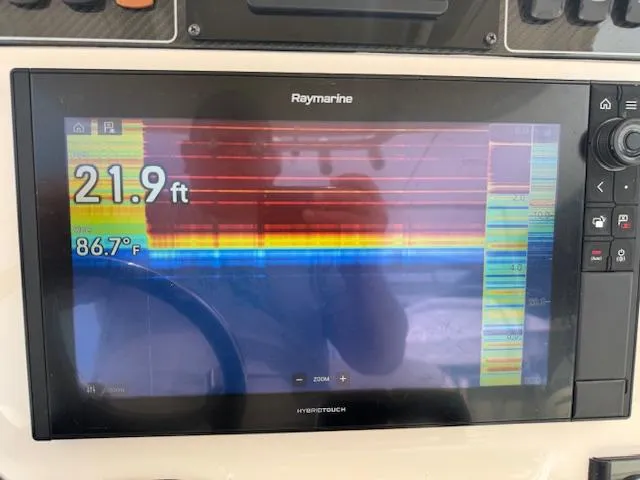 Slide: The Image of Raymarine display on 2023 Grady-White Fisherman 257 showing depth and temperature. - 36