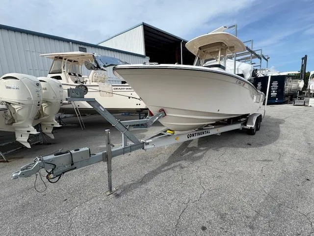 Slide: The Image of 2023 Grady-White Fisherman 257 boat on trailer in marina setting. - 6