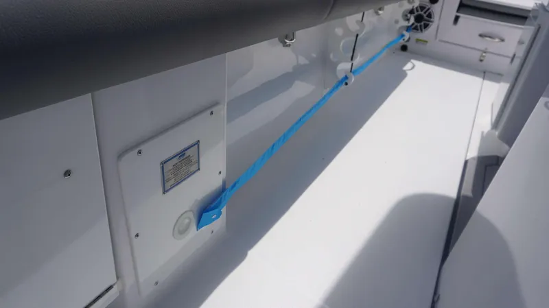 Slide: The Image of 2025 Everglades 273 CC boat interior with blue rope detail. - 10