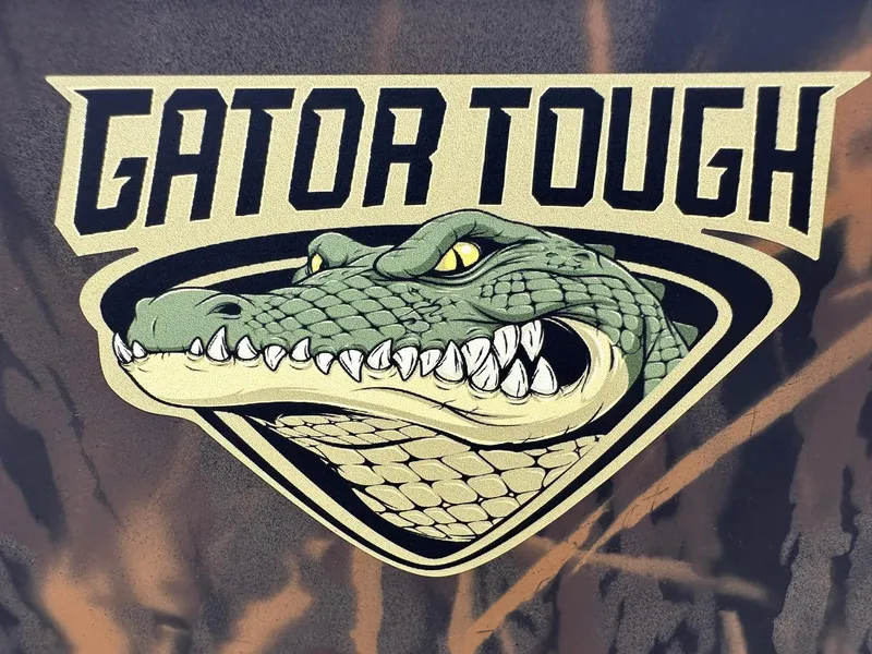 Slide: The Image of 2025 G3 Gator Tough 18 CC logo featuring fierce alligator design. - 11