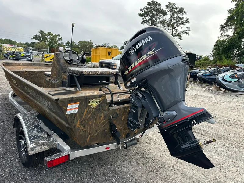 Slide: The Image of 2025 G3 Gator Tough 18 CC boat with Yamaha outboard motor on a trailer. - 4