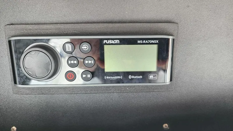 Slide: The Image of Fusion MS-RA70NSX marine stereo on 2015 Bluewater 2550 boat dashboard. - 28