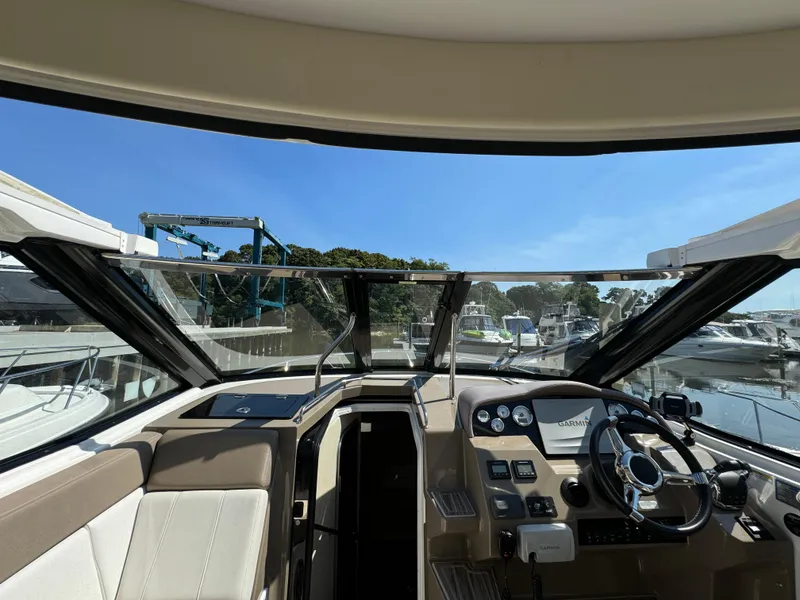 Slide: The Image of Interior view of 2016 Regal 35 Sport Coupe cockpit with steering wheel and dashboard. - 26