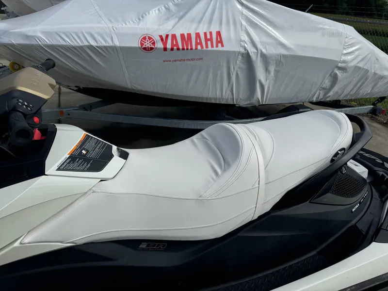Slide: The Image of 2011 Sea-Doo GTX Limited iS 260 jet ski with Yamaha cover in background. - 4