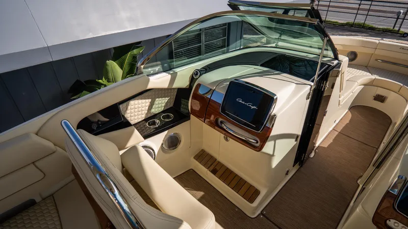 Slide: The Image of 2025 Chris-Craft Launch 31 GT cockpit with luxurious seating and modern dashboard. - 20