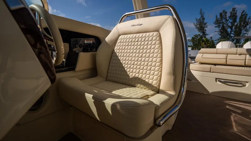 Slide: The Image of Luxurious interior of 2025 Chris-Craft Launch 31 GT boat with elegant seating. - 21