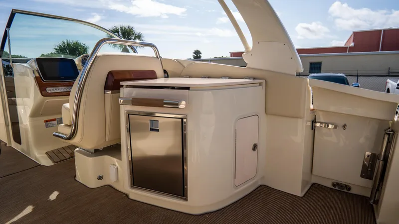Slide: The Image of 2025 Chris-Craft Launch 31 GT interior, featuring sleek cabinetry and modern design elements. - 23