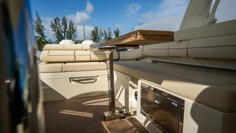 Slide: The Image of Luxurious interior of 2025 Chris-Craft Launch 31 GT boat with elegant seating and table. - 26