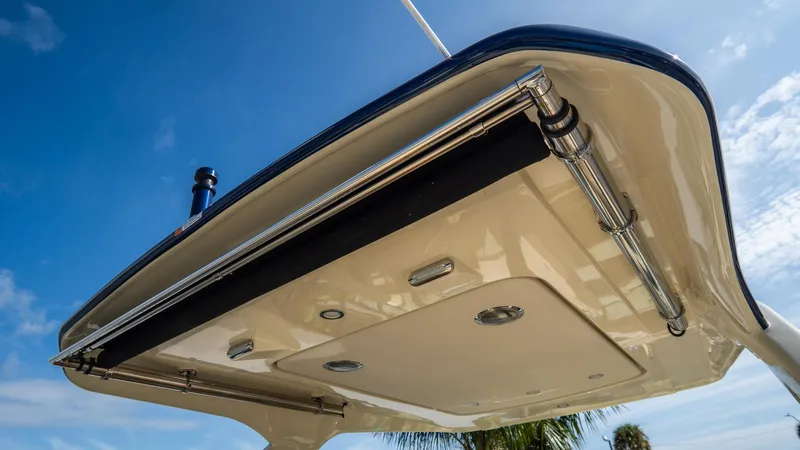Slide: The Image of 2025 Chris-Craft Launch 31 GT boat canopy against a clear blue sky. - 28