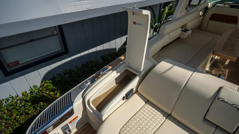 Slide: The Image of 2025 Chris-Craft Launch 31 GT boat interior with luxurious seating and storage compartment. - 30