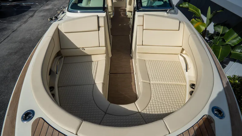 Slide: The Image of 2025 Chris-Craft Launch 31 GT boat interior with luxurious beige seating and elegant design. - 5