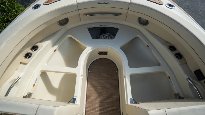 Slide: The Image of 2025 Chris-Craft Launch 31 GT boat interior with spacious seating and storage compartments. - 9