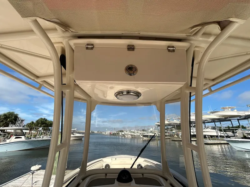 Slide: The Image of 2021 Grady-White Fisherman 216 boat interior view at marina. - 16