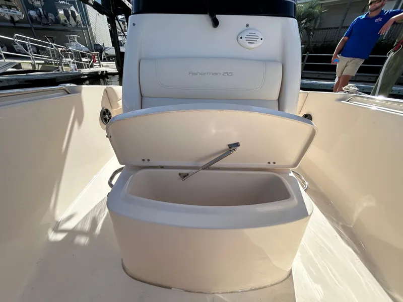 Slide: The Image of 2021 Grady-White Fisherman 216 boat with open storage compartment. - 27