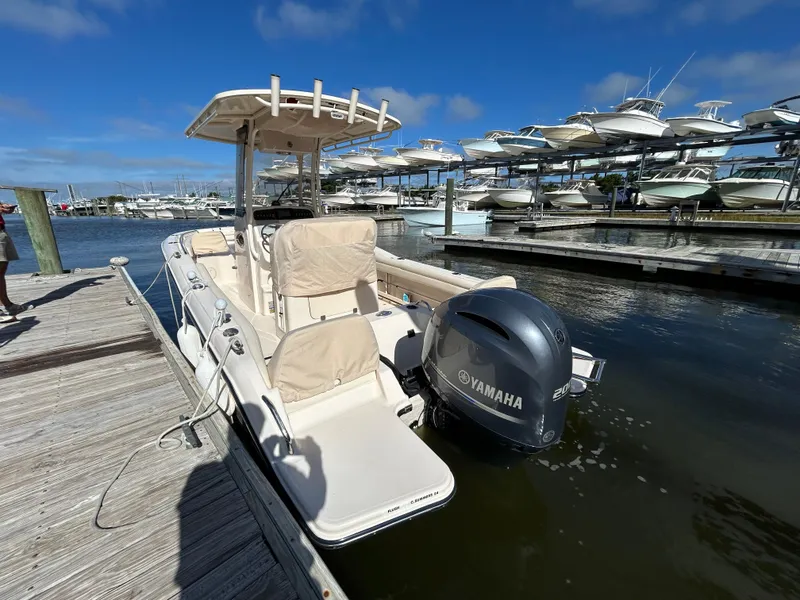 Slide: The Image of 2021 Grady-White Fisherman 216 boat docked with Yamaha outboard motor. - 3
