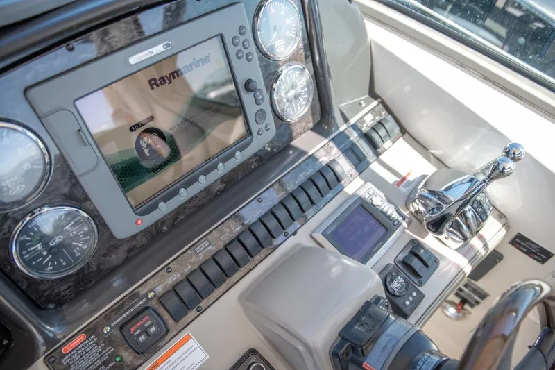 Slide: The Image of Control panel of 2008 Sea Ray 380 Sundancer with Raymarine navigation system. - 5