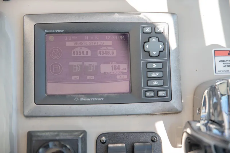 Slide: The Image of SmartCraft VesselView display on 2008 Sea Ray 380 Sundancer boat dashboard. - 6