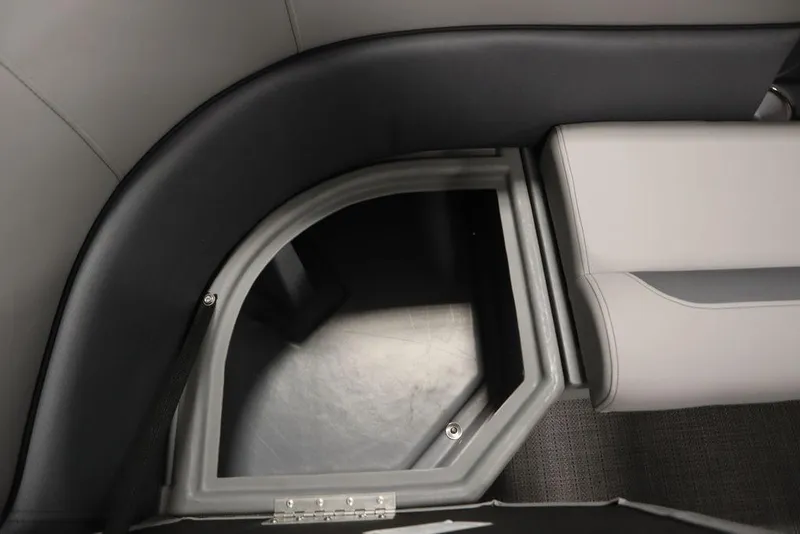 Slide: The Image of 2025 Bentley Pontoons 243 Cruise XL Tri-Toon storage compartment with sleek, modern design. - 19