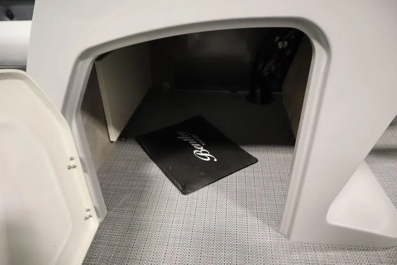 Slide: The Image of Interior storage compartment of 2025 Bentley Pontoons 243 Cruise XL Tri-Toon. - 25