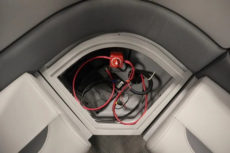 Slide: The Image of Battery compartment of 2025 Bentley Pontoons 243 Cruise XL Tri-Toon with wiring and switch. - 35