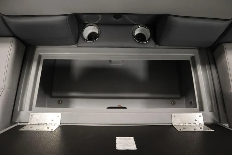 Slide: The Image of 2025 Bentley Pontoons 243 Cruise XL Tri-Toon storage compartment with cup holders. - 36