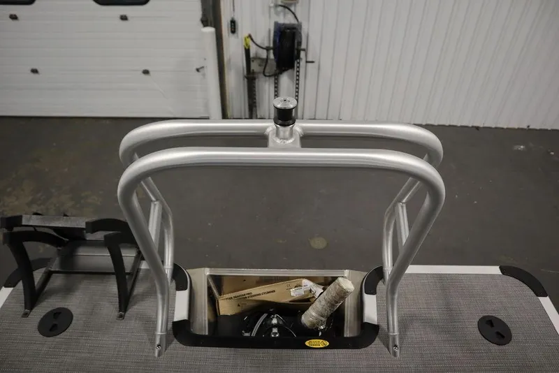 Slide: The Image of 2025 Bentley Pontoons 243 Cruise XL Tri-Toon rear deck with ladder and storage compartment. - 40