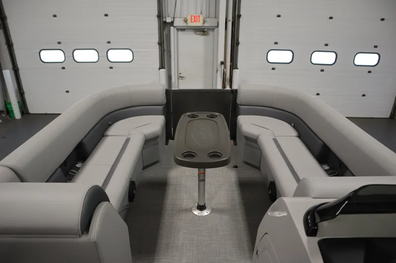 Slide: The Image of 2025 Bentley Pontoons 243 Cruise XL Tri-Toon in a warehouse setting. - 6