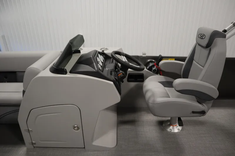 Slide: The Image of 2025 Bentley Pontoons 243 Cruise XL Tri-Toon in a showroom, side view. - 8