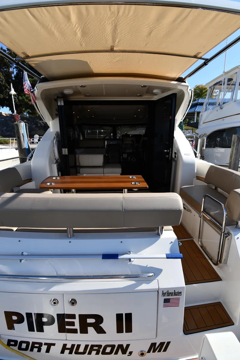 Slide: The Image of 2017 Carver C37 Coupe yacht, rear view, docked in Port Huron, MI. - 13