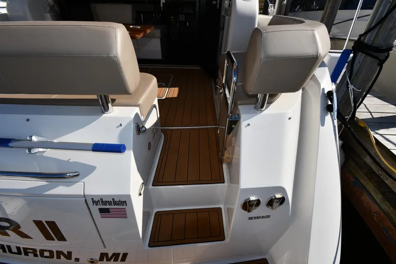 Slide: The Image of 2017 Carver C37 Coupe boat with teak deck and seating, docked at Port Huron. - 15