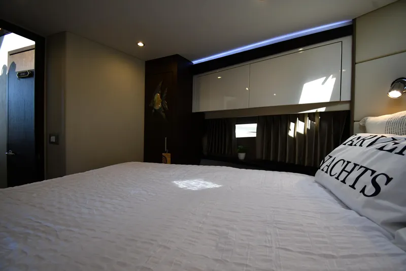 Slide: The Image of Luxurious interior of 2017 Carver C37 Coupe yacht bedroom with modern design. - 29