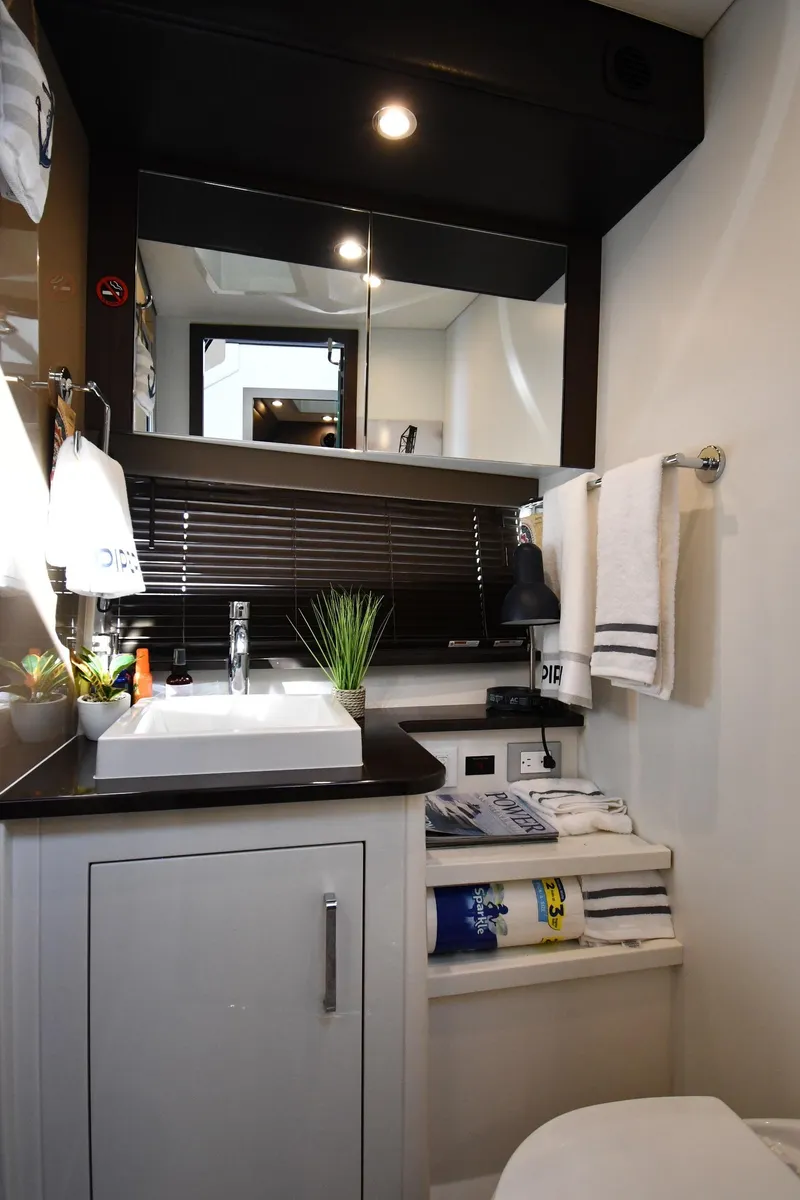 Slide: The Image of Modern bathroom in 2017 Carver C37 Coupe yacht with sleek fixtures and decor. - 33