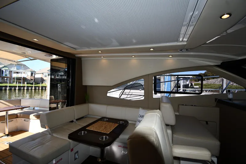 Slide: The Image of Luxurious interior of 2017 Carver C37 Coupe yacht with elegant seating and modern design. - 45