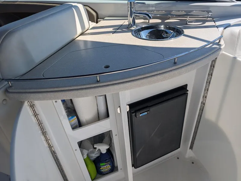 Slide: The Image of 2007 Cobalt 323 boat interior with sink and mini fridge. - 36