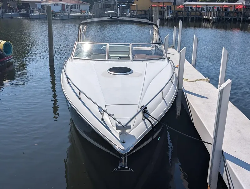 Slide: The Image of 2007 Cobalt 323 boat docked at marina, front view. - 4