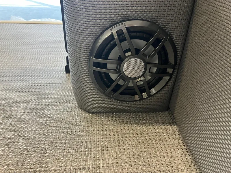 Slide: The Image of Speaker on 2024 Crest 220 SLC boat with textured upholstery. - 8