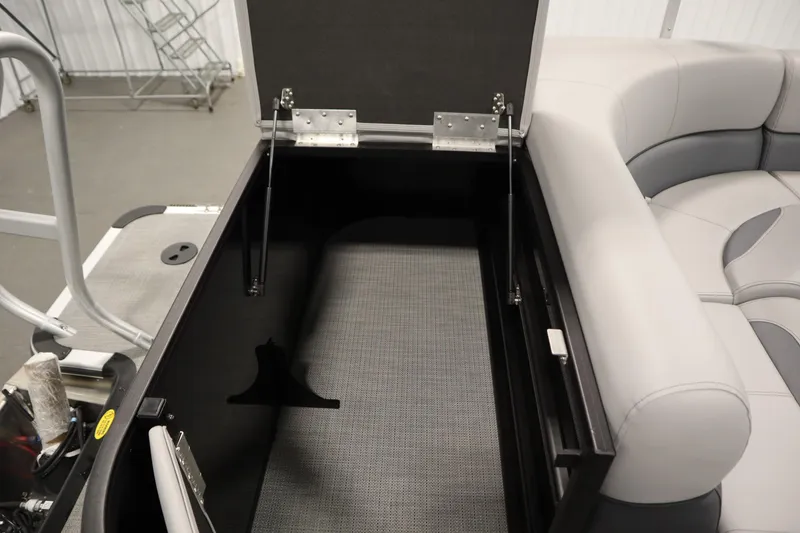 Slide: The Image of Open storage compartment in 2025 Bentley Pontoons 240 CRUISE boat interior. - 16