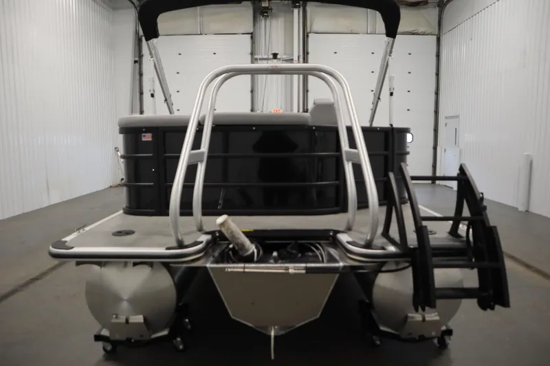 Slide: The Image of 2025 Bentley Pontoons 240 CRUISE pontoon boat in a garage setting. - 3