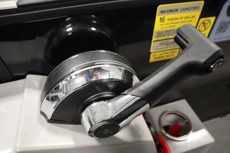 Slide: The Image of Close-up of throttle control on 2025 Bentley Pontoons 240 CRUISE boat. - 31