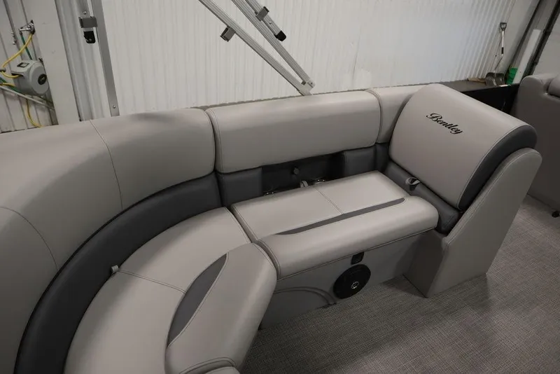 Slide: The Image of 2025 Bentley Pontoons 240 CRUISE interior with luxurious gray seating and Bentley logo. - 33