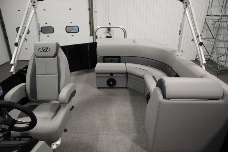 Slide: The Image of 2025 Bentley Pontoons 240 CRUISE interior with gray seating and modern design. - 37