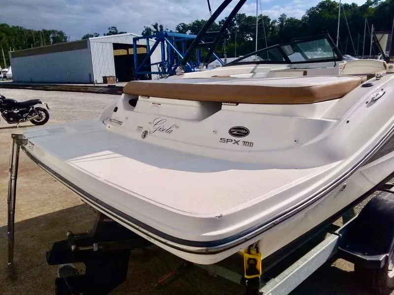 Slide: The Image of 2017 Sea Ray SPX 190 boat on trailer at marina. - 6
