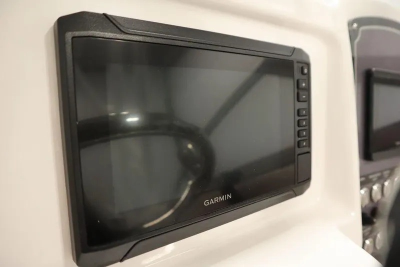 Slide: The Image of Garmin display on 2025 Sea Fox 228 Traveler boat dashboard. - 19