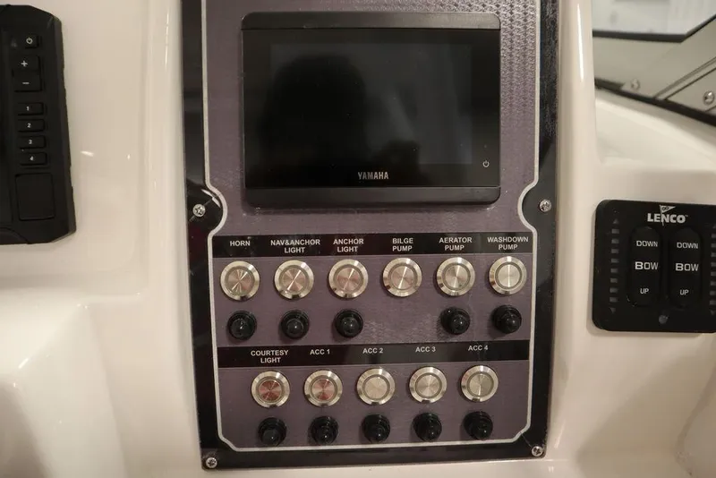 Slide: The Image of Control panel of 2025 Sea Fox 228 Traveler boat with Yamaha display and switches. - 20