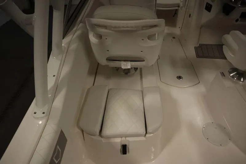 Slide: The Image of 2025 Sea Fox 228 Traveler boat interior with white seating and sleek design. - 29