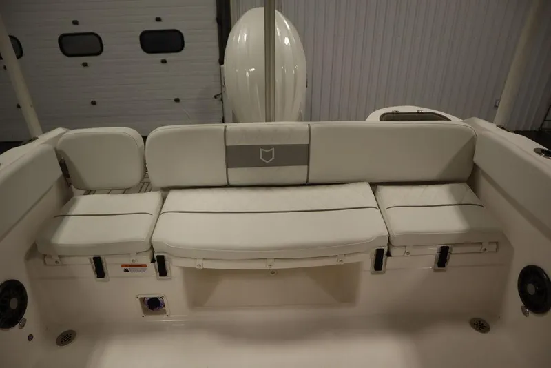 Slide: The Image of 2025 Sea Fox 228 Traveler boat interior with cushioned seating. - 35